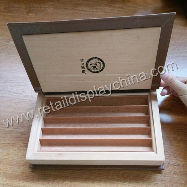 Portable humidors with leather surface